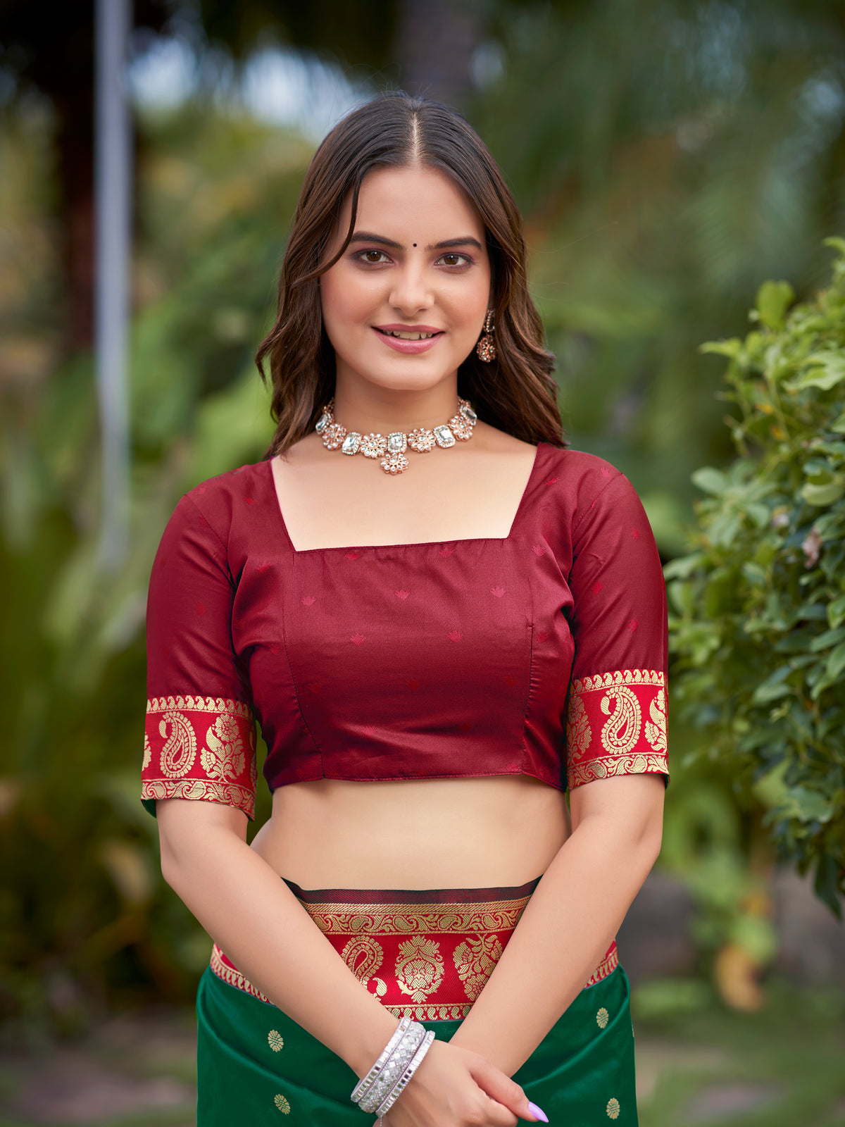 Emerald Green & Maroon Designer Saree with Gold-Tone Butti & Rich Border